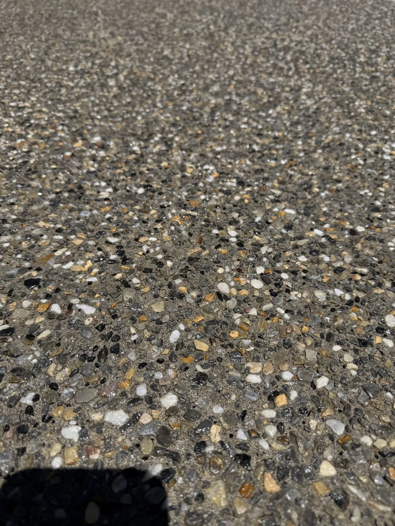 Close up of exposed aggregate concrete finish