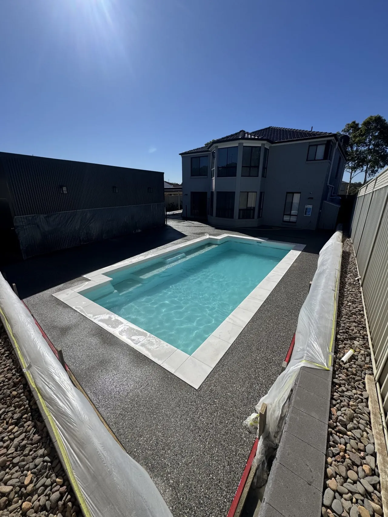 Exposed aggregate pool surround