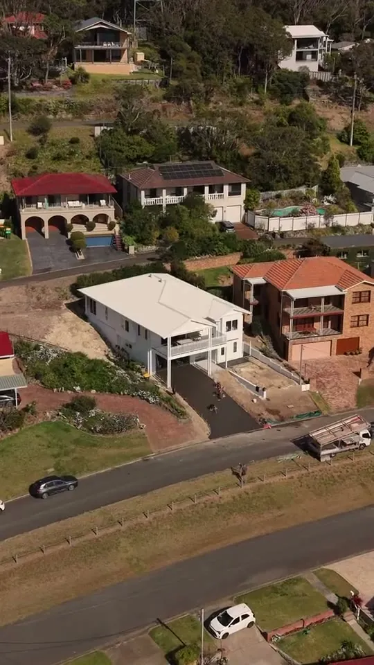 Video testimonial from a Desired Concrete & Landscapes customer, aerial view of the finished home